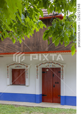 Traditional Czech Wine Cellar showcasing colorful floral decorations in Prusanky, Czechia Traditional Czech Wine Cellar showcasing colorful floral decorations in Prusanky, Czechia 126217348