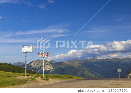 Col d'Aspin mountain pass sign indicating altitude and gradient in French Pyrenees Col d'Aspin mountain pass sign indicating altitude and gradient in French Pyrenees 126217361