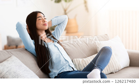 Lazy Weekend. Calm Korean Woman Leaning Back On Couch With Closed Eyes, Resting At Home, Relaxing On Comfortable Sofa In Living Room With Hands Behind Head, Enjoying Demestic Pastime, Copy Space 126217480