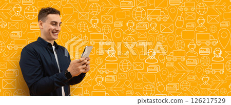 A customer happily interacts with a smartphone app for making purchases online. The bright background features icons representing e-commerce and delivery services. 126217529