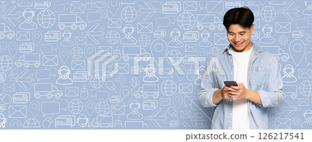 A buyer happily uses their smartphone to shop online, surrounded by a collage of delivery and shopping icons. The setting reflects a contemporary digital commerce environment. 126217541