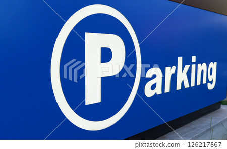 Parking sign clearly guides drivers to spots Parking sign clearly guides drivers to spots 126217867