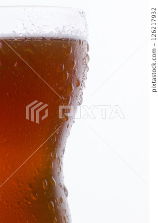 Zebra striping and damp drinking. Tasty drink in glass isolated on white Zebra striping and damp drinking. Tasty drink in glass isolated on white 126217932