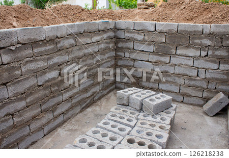 The process of building a home pool for storing water 126218238