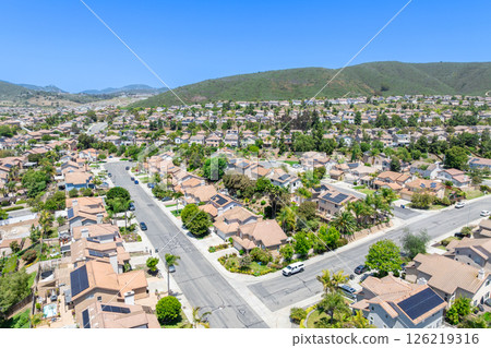 Aerial view of San Marcos neighborhood, with houses and street. South California Aerial view of San Marcos neighborhood, with houses and street. South California 126219316