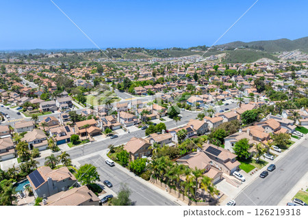 Aerial view of San Marcos neighborhood, with houses and street. South California 126219318