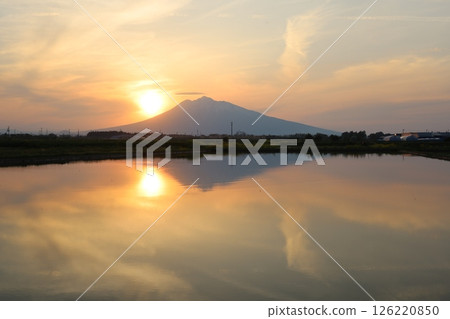 Sunset reflected in rice paddies and Mt. Iwaki 126220850