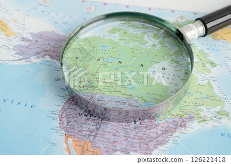 Bangkok, Thailand December 10, 2023 Canada map in world map paper. Bangkok, Thailand December 10, 2023 Canada map in world map paper. 126221418