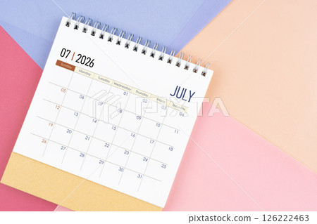 July 2026 month desk calendar on colorful background. July 2026 month desk calendar on colorful background. 126222463