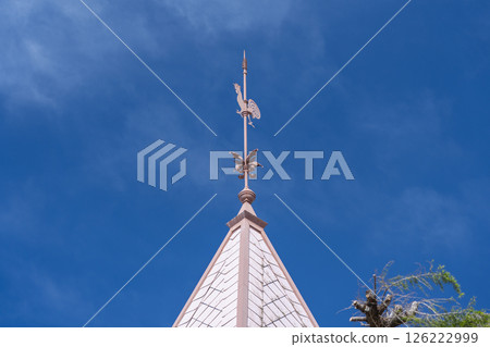 A weather chicken at a windmill chapel A weather chicken at a windmill chapel 126222999