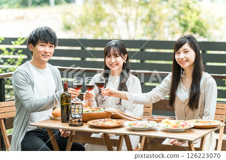 Young Asian couple having a home party/glamping at a villa/cottage 126223070