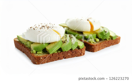 Healthy avocado toast with poached eggs, , isolated on white background Healthy avocado toast with poached eggs, , isolated on white background 126223270