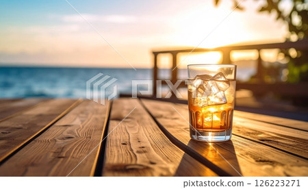cold refreshing beverage resting on wooden table cold refreshing beverage resting on wooden table 126223271