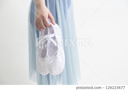 Woman with ballet shoes Woman with ballet shoes 126223677