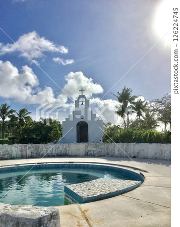 Dead Sea, white resort pool at the poolside of a resort hotel, tropical church and pool 126224745