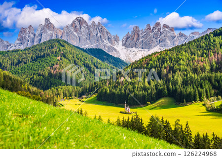Val di Funes, Dolomites - Odle Ridge and Santa Maddalena village and iconic church. Val di Funes, Dolomites - Odle Ridge and Santa Maddalena village and iconic church. 126224968