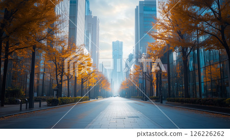 一條空曠的城市街道,周圍是摩天大樓,還有日出和日落 一條空曠的城市街道,周圍是摩天大樓,還有日出和日落 126226262