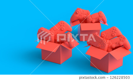 Set of gamer joysticks or gamepads in cardboard box on monochrome background Set of gamer joysticks or gamepads in cardboard box on monochrome background 126228503