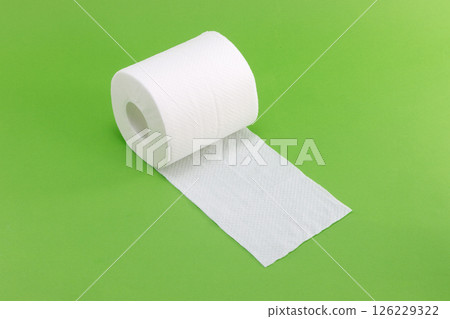 White toilet paper on a green background White toilet paper on a green background 126229322
