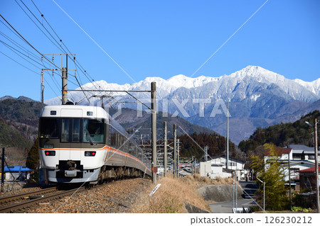 Snow-capped Kiso Mountains and the Central Japan Railway Line 383 Series Shinano Express 126230212