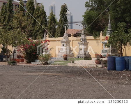 The Tranquil Buddhist Stupas are beautifully located in a serene garden enhancing peace The Tranquil Buddhist Stupas are beautifully located in a serene garden enhancing peace 126230313