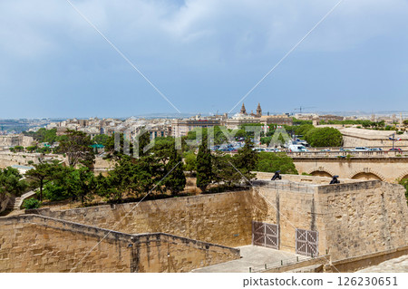 Historic cityscape with fortification walls and cannons in Valletta 126230651