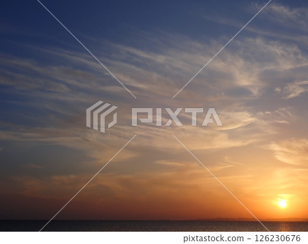 Beautiful sunset over the East China Sea due to the influence of yellow sand 126230676