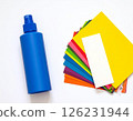 Colored paper and glue on the table 126231944