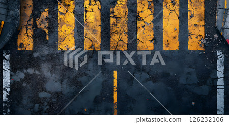 Worn Asphalt Pedestrian Crosswalk with Cracked Yellow Lines Worn Asphalt Pedestrian Crosswalk with Cracked Yellow Lines 126232106