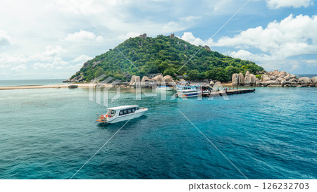 Tourist boats dock on the island in summer. 126232703