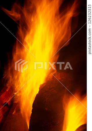 A flame that burns bright red 126232815