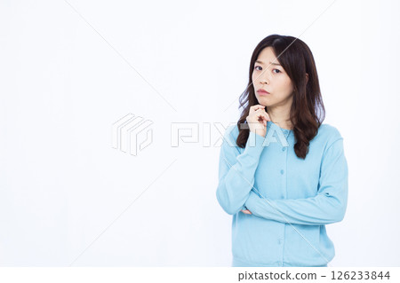A woman who is seriously worried 126233844