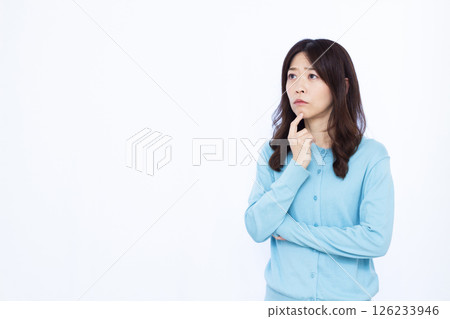 A woman who is seriously worried A woman who is seriously worried 126233946