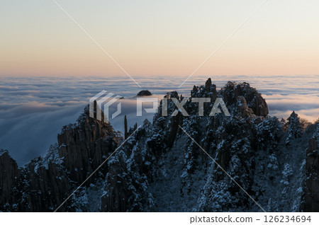 Sunrise on Huangshan, a famous mountain in China Sunrise on Huangshan, a famous mountain in China 126234694