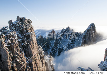 Sunrise on Huangshan, a famous mountain in China Sunrise on Huangshan, a famous mountain in China 126234705
