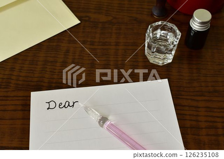 Letter and glass pen 126235108