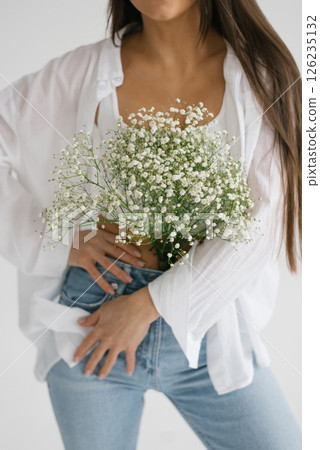 Woman Holding Gypsophila Bouquet 126235132