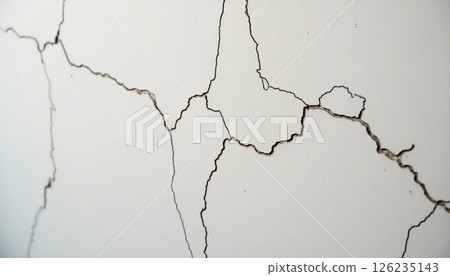 Intricate cracks traverse a weathered wall, showcasing the passage of time in an urban environment. Light filters through, emphasizing the delicate lines and textures Generative AI Intricate cracks traverse a weathered wall, showcasing the passage of time in an urban environment. Light filters through, emphasizing the delicate lines and textures Generative AI 126235143