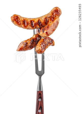 The grilled sausage on the fork isolated on white background 126235493