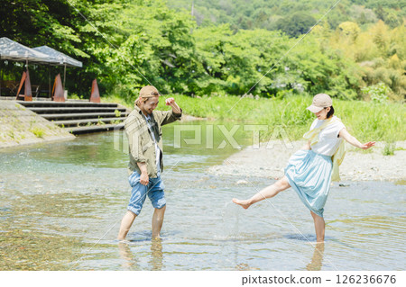 couple playing in the river couple playing in the river 126236676