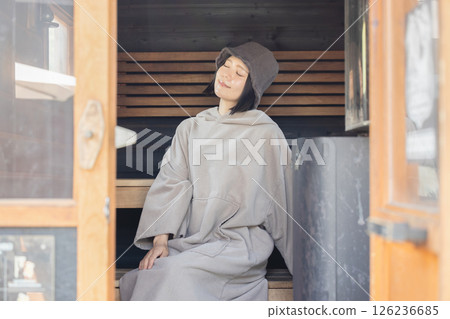 Woman entering the sauna 126236685