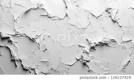 The surface displays a blend of rough and smooth textures, with areas of peeling white paint revealing various shades and layers underneath in a bright setting. 126237429