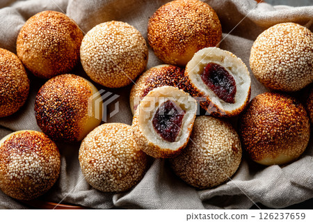 Chinese sweet rice balls covered in sesame seeds 126237659