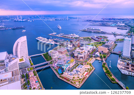 Four luxury cruise ships in Yokohama cityscape, Japan. Norwegian... and the Riviera, Diamond... and Queen... 126237709