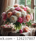 An arrangement of fresh peonies in a vase. 126237807