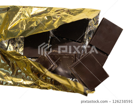 High resolution image of dark chocolate pieces in its shiny wrapper on white background High resolution image of dark chocolate pieces in its shiny wrapper on white background 126238591