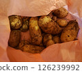 Potatoes dug up at a potato digger stock photo 126239992