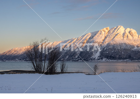 Mountains with snow in sunrise, Hamnvik, Norway 126240913