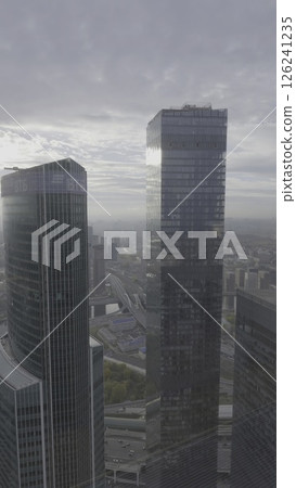 A Stunning Modern Skyline View Featuring a Cloudy Atmosphere Above the City Landscape. Action 126241235