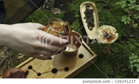 Experience the serene and tranquil ambiance of tea surrounded by nature in a delightful setting. Media Experience the serene and tranquil ambiance of tea surrounded by nature in a delightful setting. Media 126241237